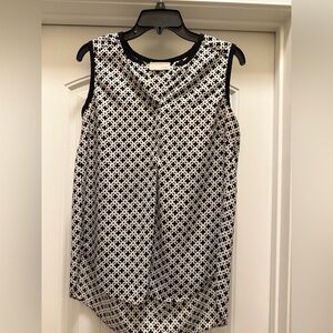 Sleeveless Black and White Patterned Blouse